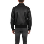 Black leather jacket worn by a person on a white background