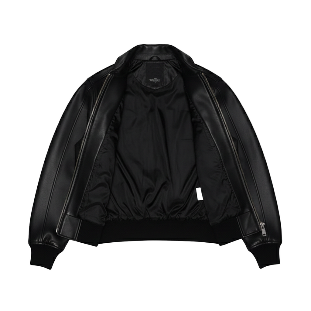 Black leather jacket on a white background with a brand logo in the corner.