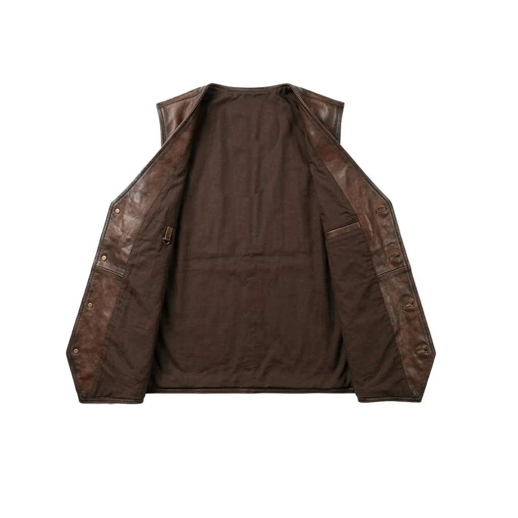 Brown leather jacket on a white background with a brand logo.