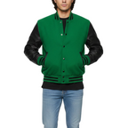 Green varsity jacket with black sleeves worn by a person on a white background