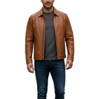 Man wearing a brown leather jacket over a gray shirt on a white background