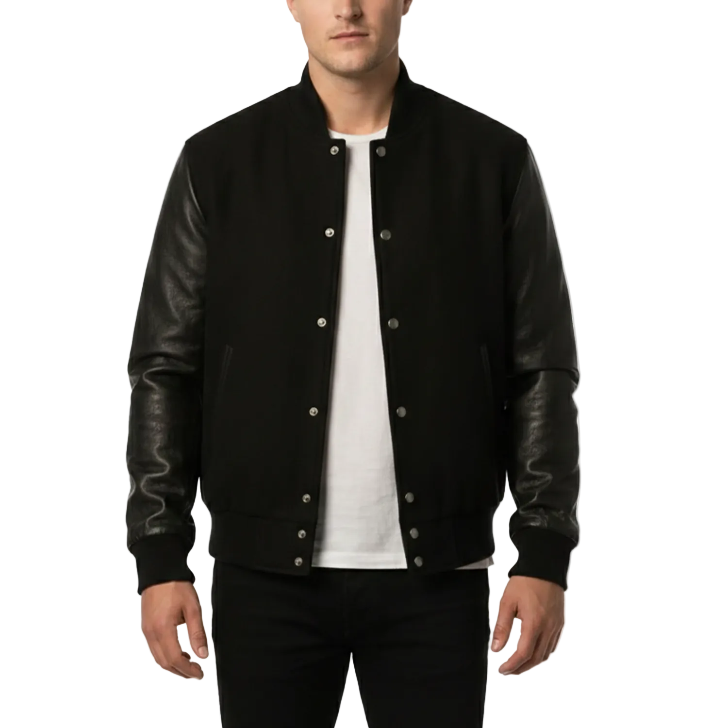 Man wearing a black varsity jacket with leather sleeves on a white background