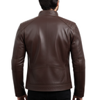 Brown leather jacket worn by a person on a white background