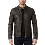 Brown leather jacket worn by a person on a white background