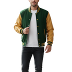 Man wearing a green and yellow varsity jacket on a white background