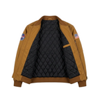 Brown jacket with quilted black lining and patches on a white background