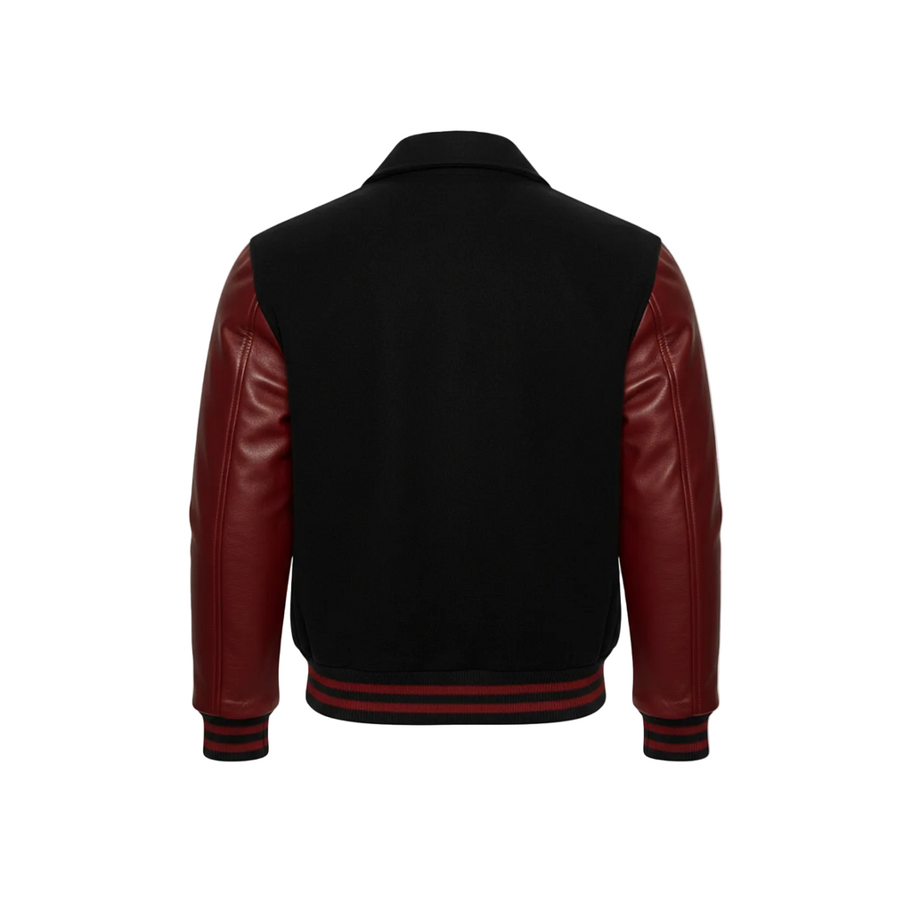 Black varsity jacket with red leather sleeves on a white background