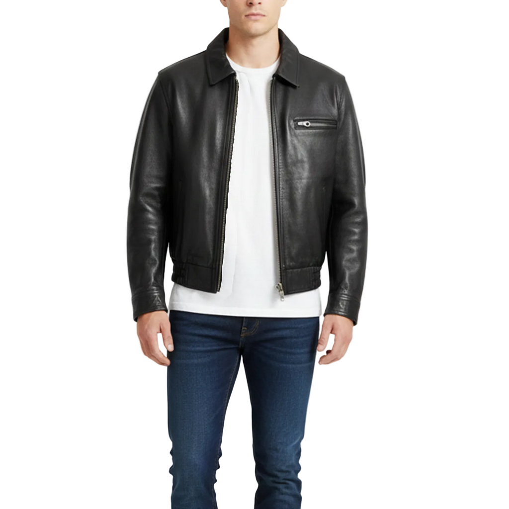 Man wearing a black leather jacket, white shirt, and blue jeans on a white background with a brand logo.