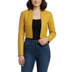Woman wearing a mustard yellow leather jacket, black top, and blue jeans on a white background.
